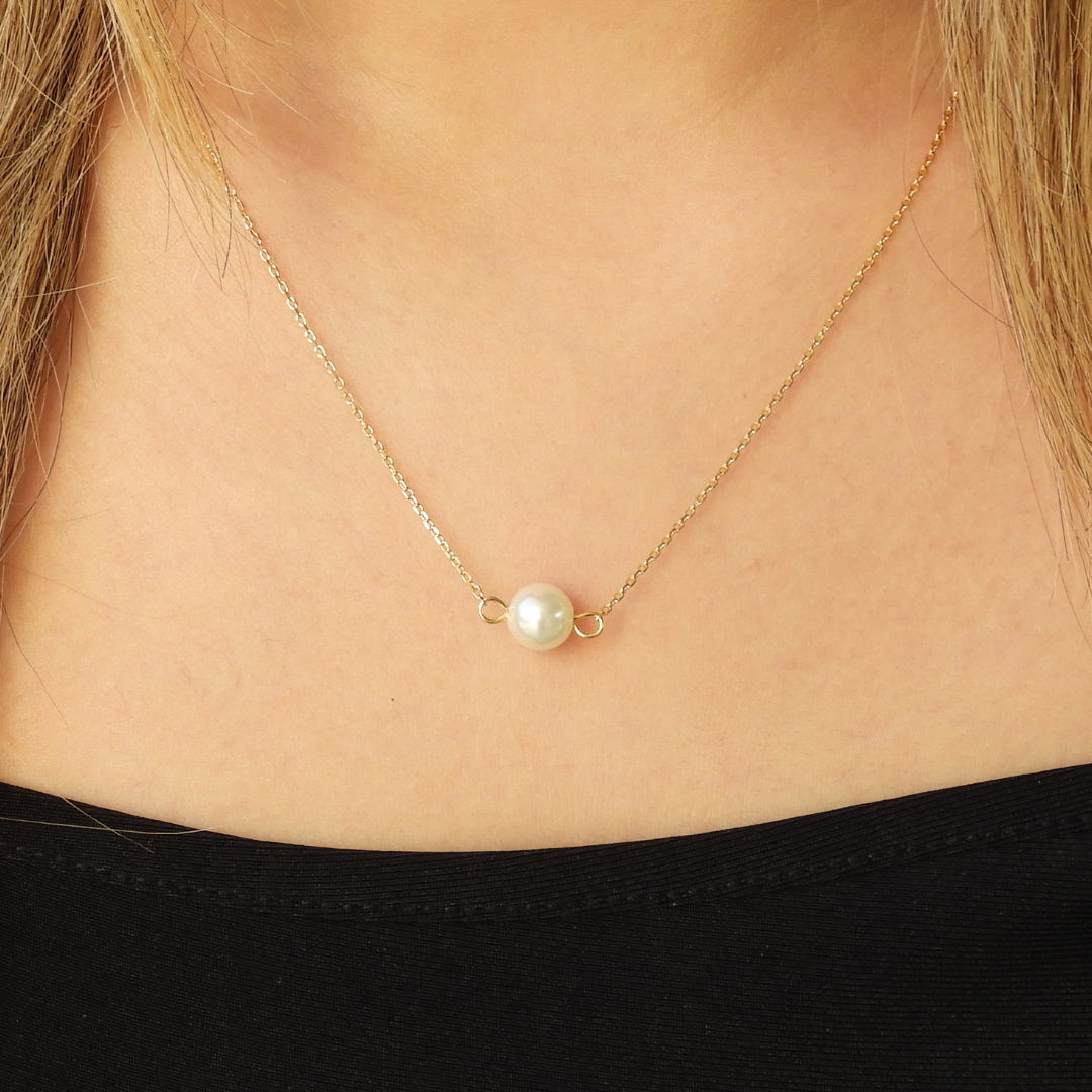 Collar de perla en chapa de oro