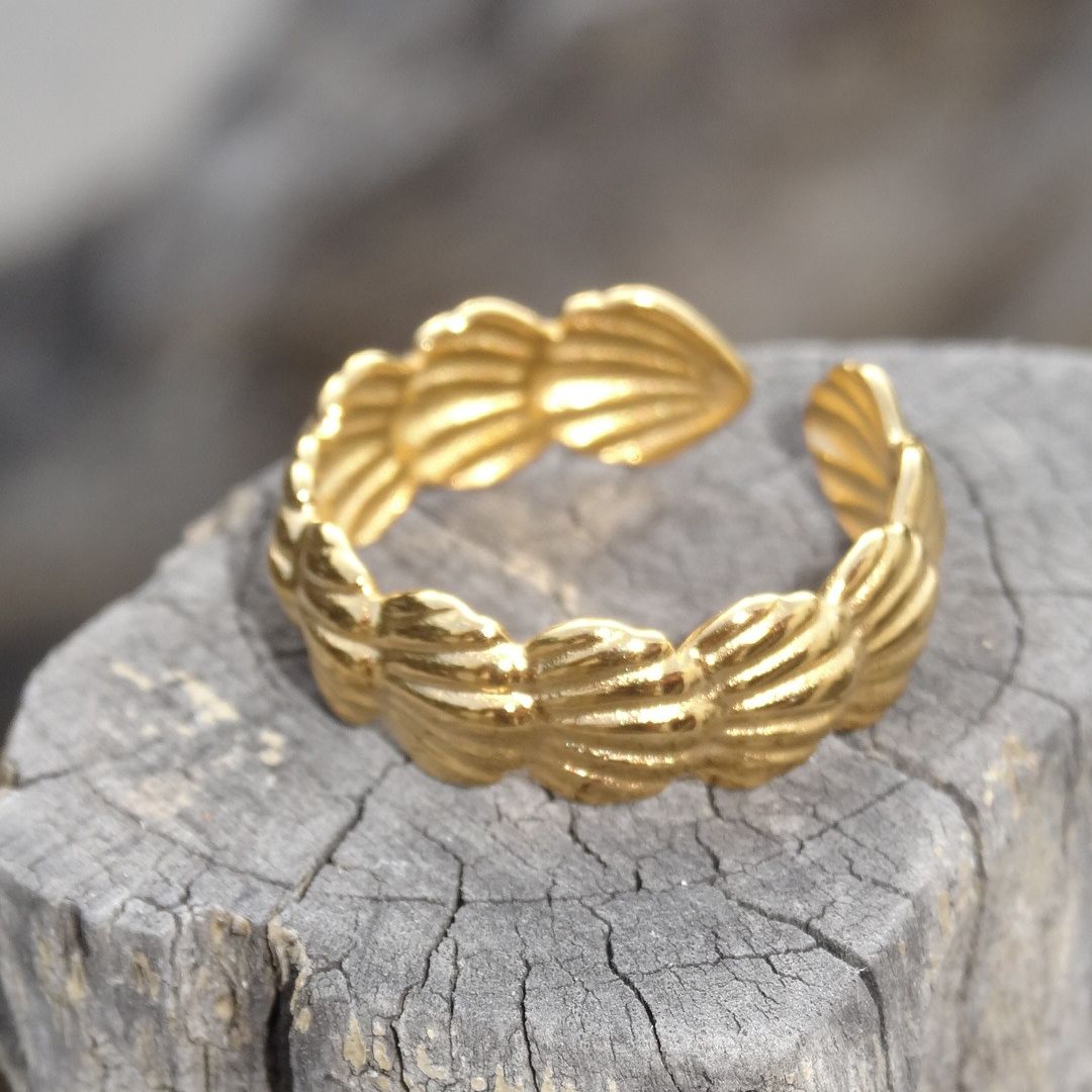 Anillo de cochitas dorado