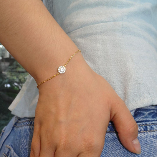 Pulsera dorada delgadita con bola con zirconias