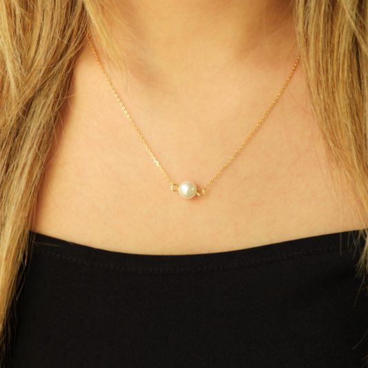 Collar de perla en chapa de oro