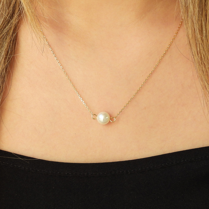 Collar de perla en chapa de oro