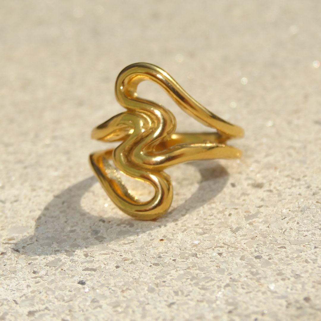 Anillo corazones irregulares dorado
