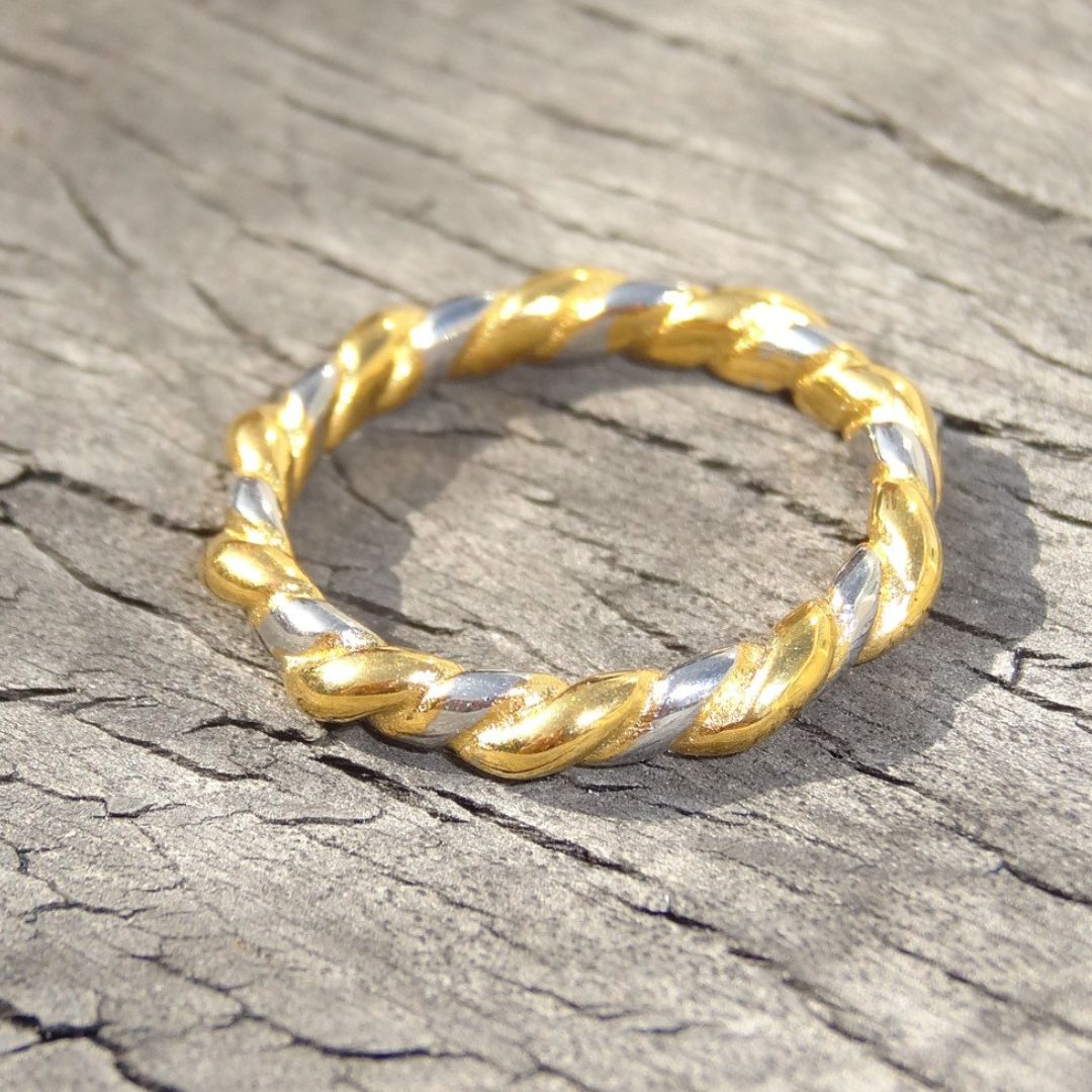 Anillo bicolor trenzado