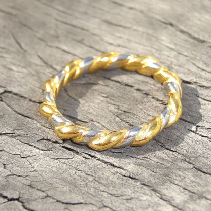 Anillo bicolor trenzado