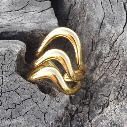 Anillo triple ondulado dorado