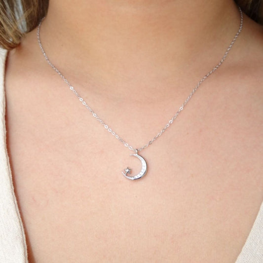 Collar media luna y estrella plateado