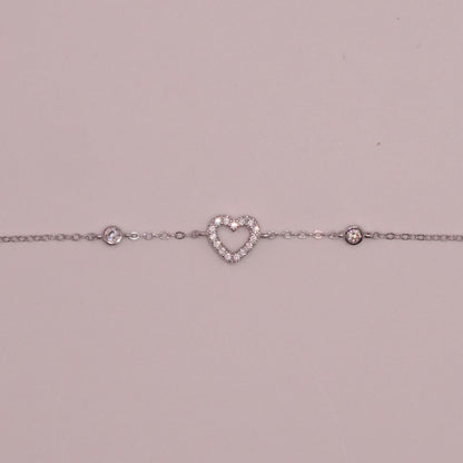 Pulsera delgada corazón plateada